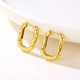 Hammered Oval Hoop Earrings Gold - VIRAGE London